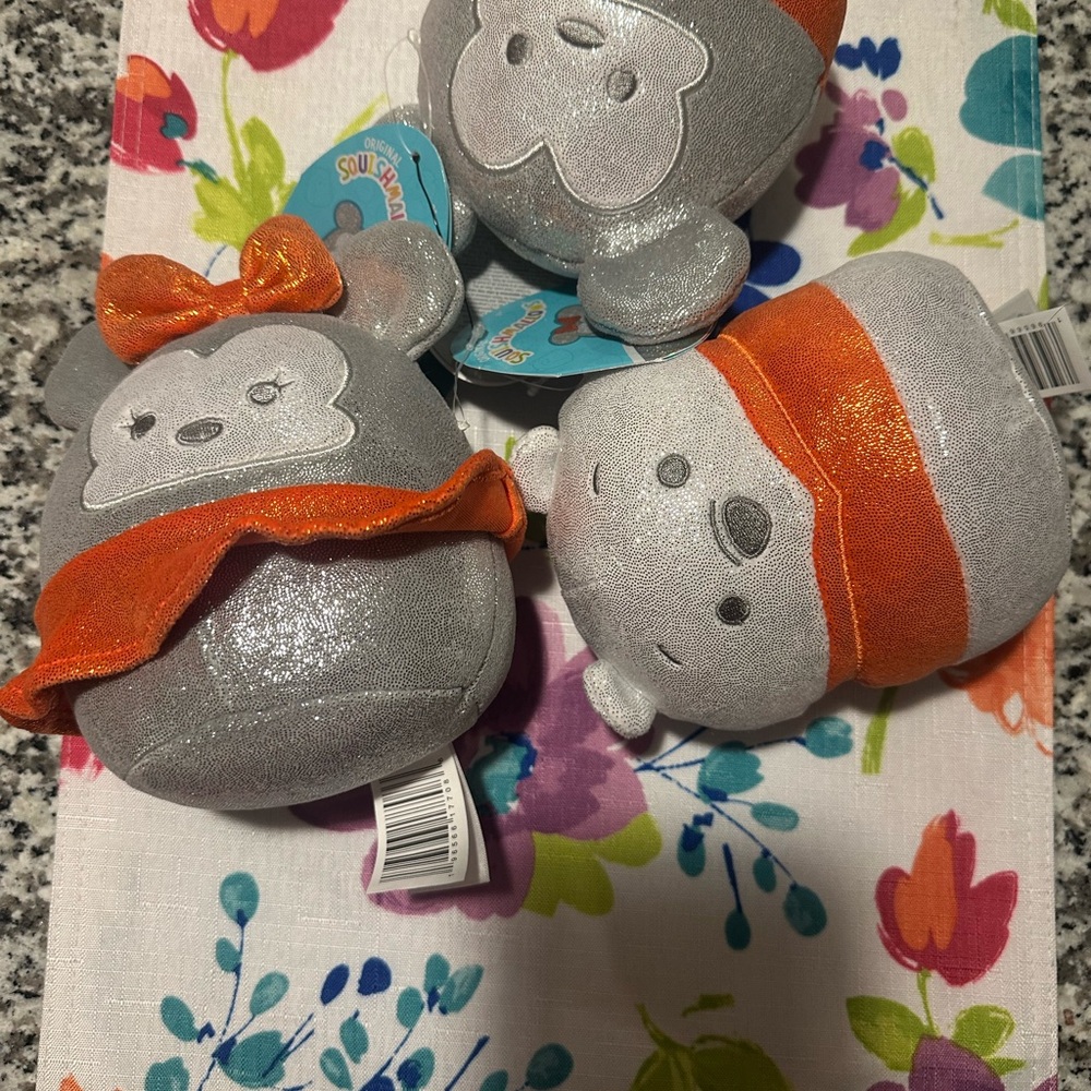 Silver and Orange Plush Toys
